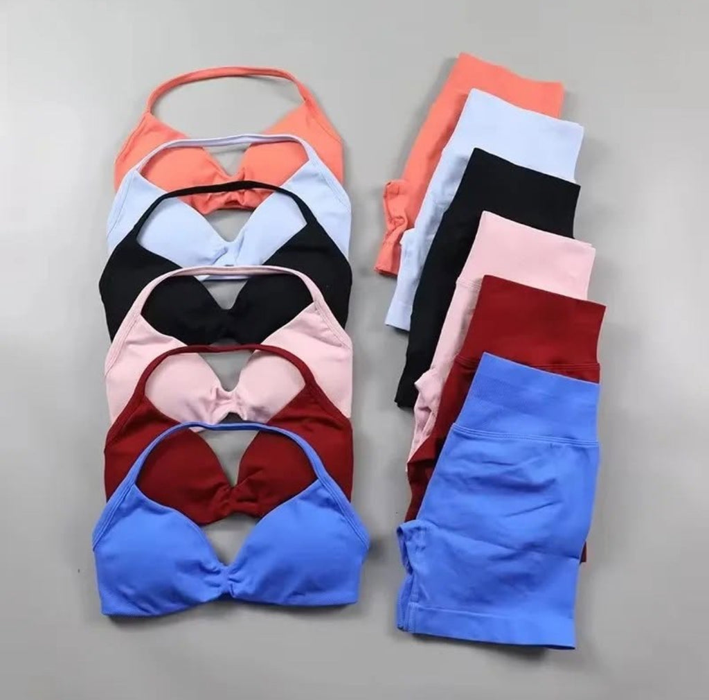 2 piece set Dewbera Women Solid Color
Hollow Camisole & Shorts Sport...